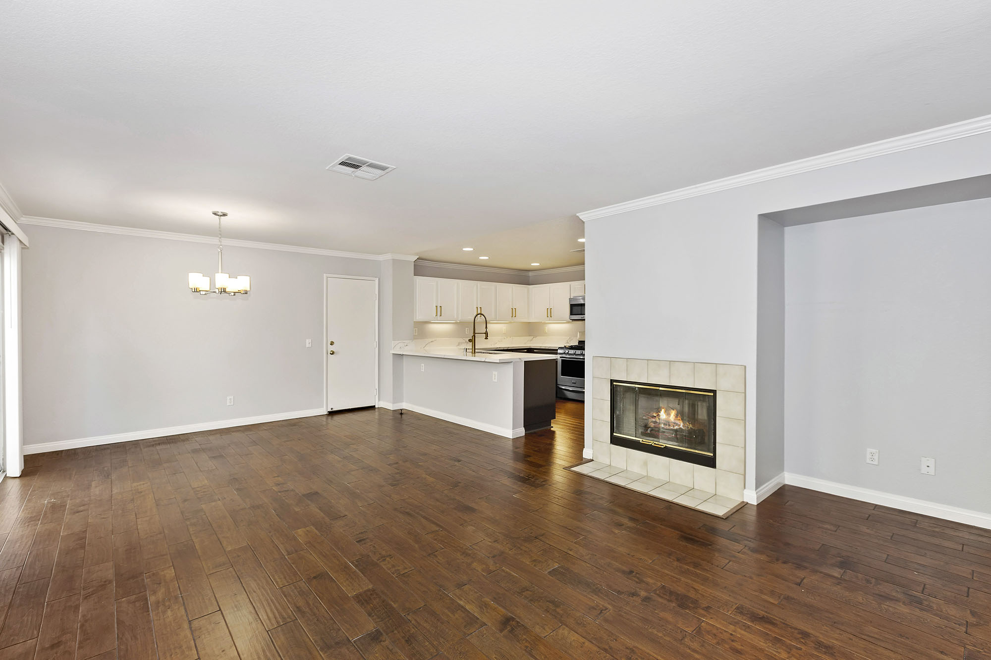 Living Room with Fireplace & Dining Area