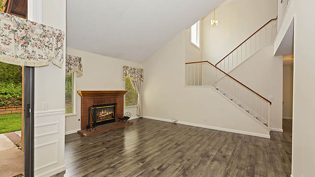 Living Room with Fireplace - Staircase