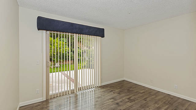 First Floor Bedroom with Sliding Door to Backyard