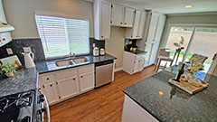 Kitchen & View of Backyard