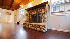 Stone Fireplace with Thick Wood Mantle