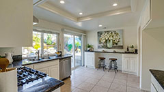 Kitchen with Sliding Glass Door Backyard Access